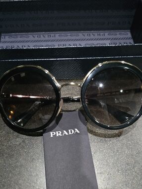 Prada Round Sunglasses in Black and Gold
